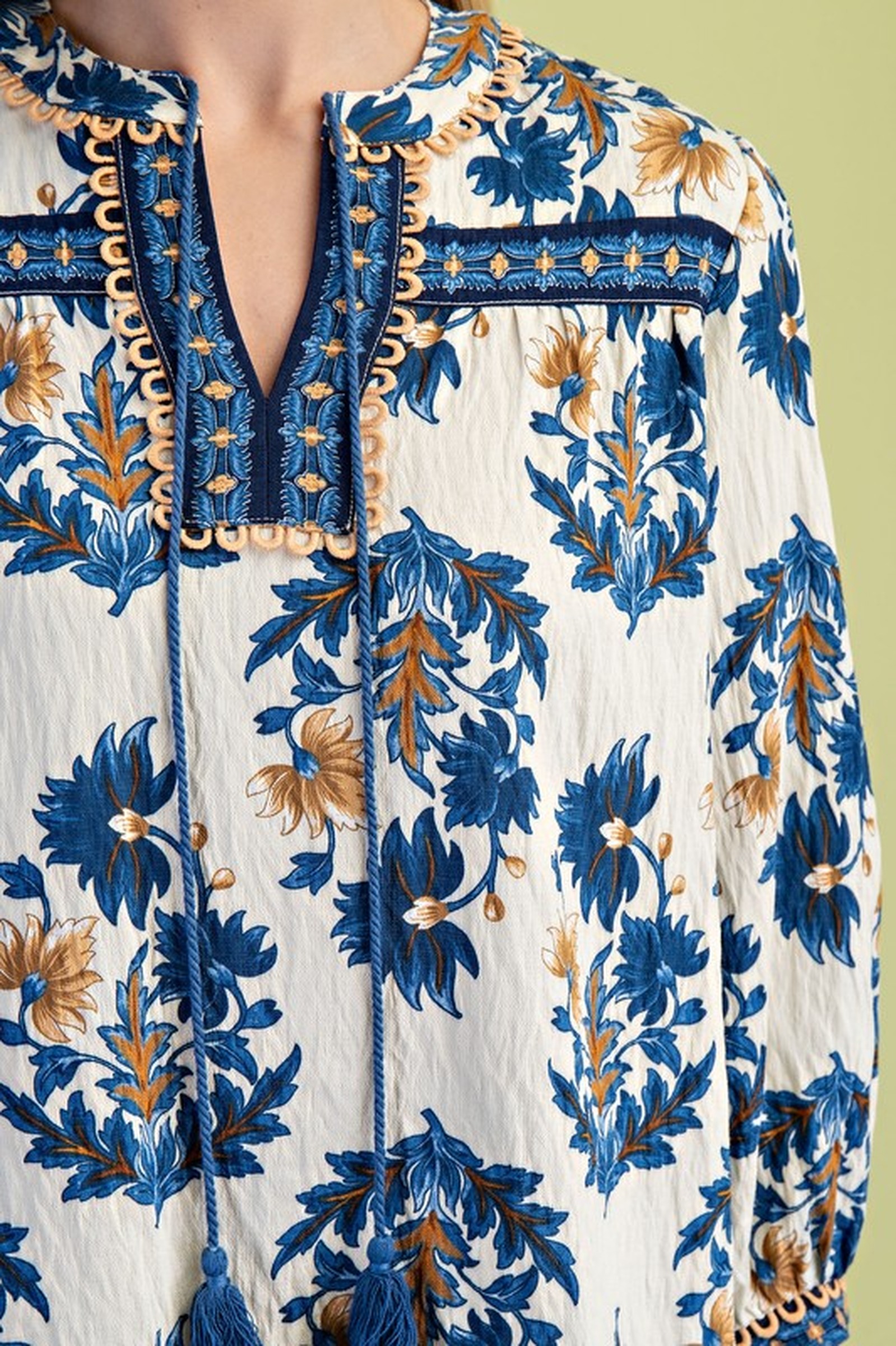 A floral-print blouse with embroidered detail, the kind of easy, wearable clothing Autumn & April carries.